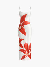 Ärmelloses, langes Kleid mit Blumenmuster und Schlitz